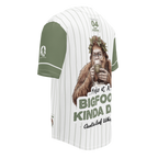 Baseball jersey with a Bigfoot graphic and text on a white background