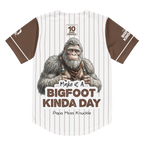 Baseball jersey with a Bigfoot graphic and text on a white background