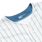 Close-up of a white shirt with blue stripes and a visible brand label.