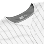 Close-up of a white baseball jersey with gray trim and brand logo.