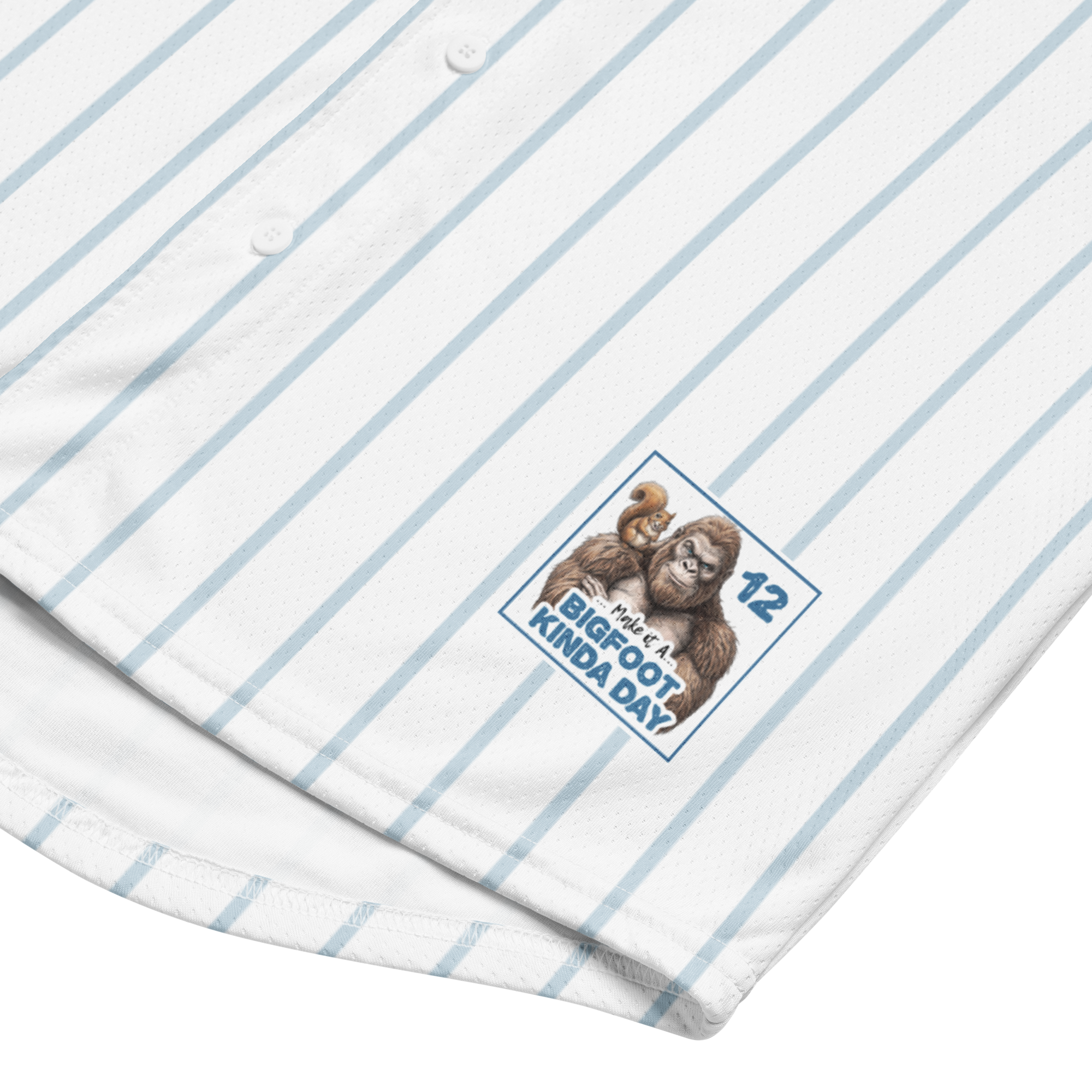 Close-up of a shirt with a cartoon monkey and text on a white background