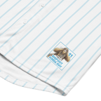 Close-up of a shirt with a cartoon Sasquatch design and text on a white background with blue stripes.