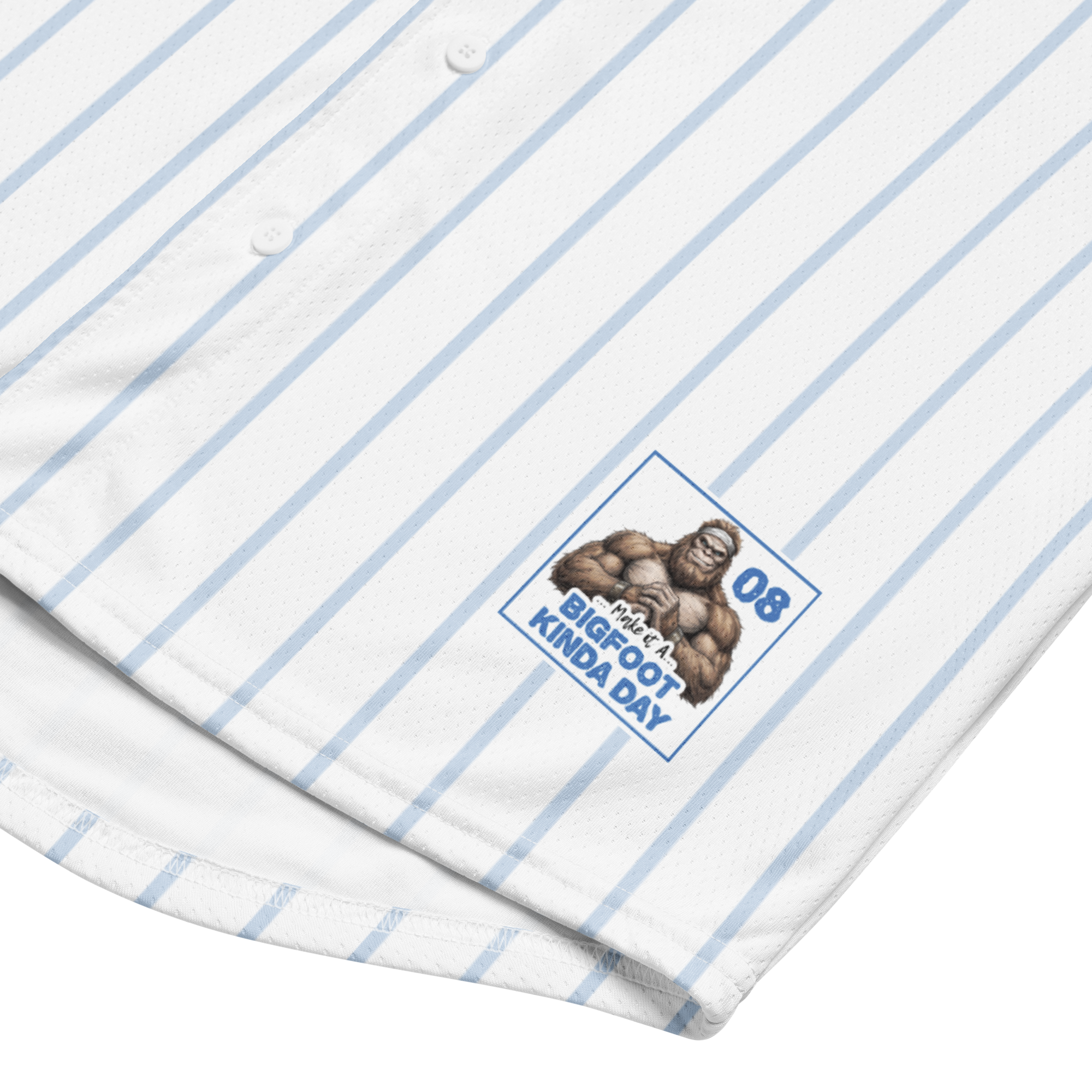 White shirt with yellow pinstripes and a logo featuring a monkey and text on a white background