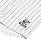 White shirt with green pinstripes and a patch on the chest