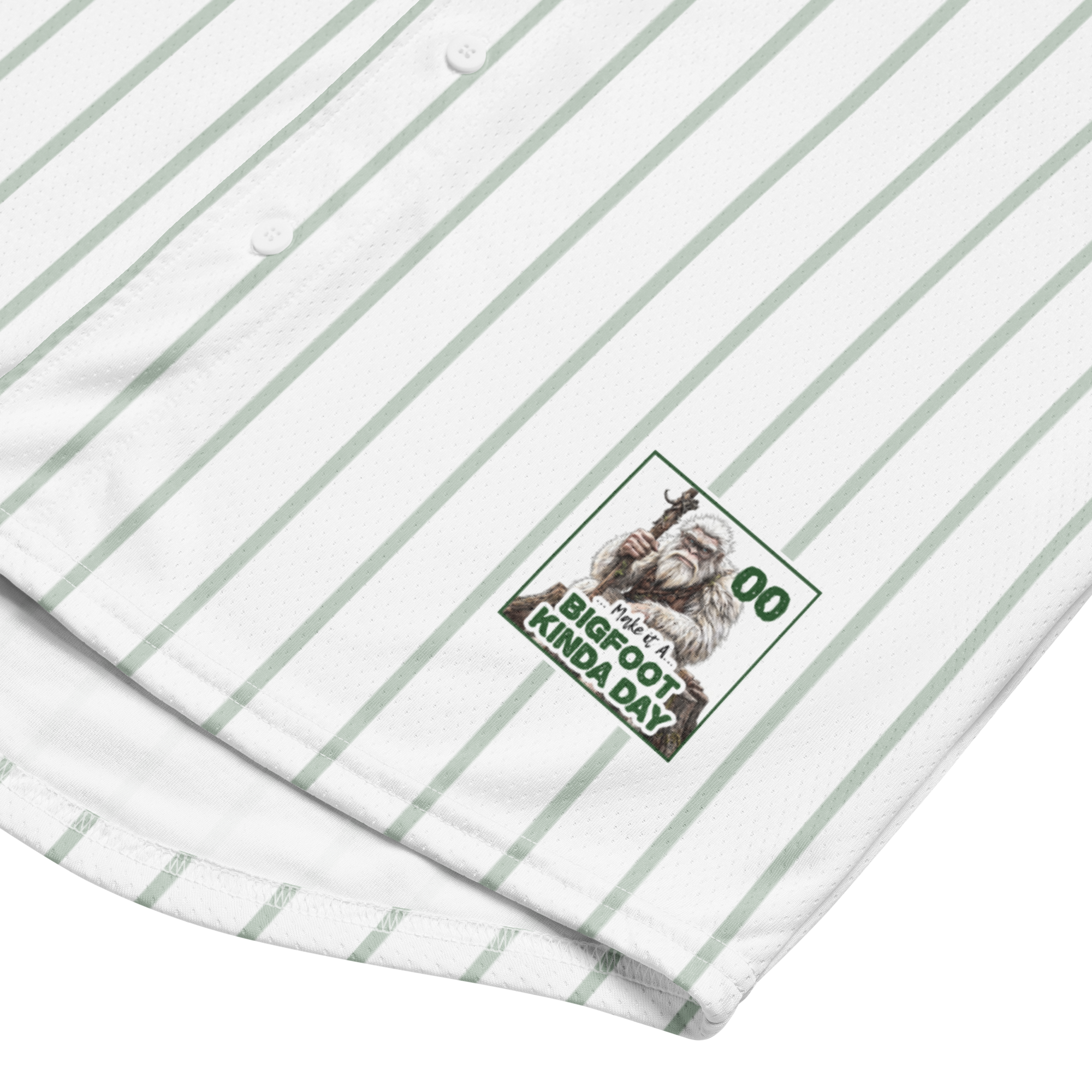 White shirt with green pinstripes and a patch on the chest