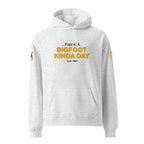 Front view of Official Forest League #02 Cousin Niblet white heather relaxed hoodie with golden-orange character artwork and number details. mockup